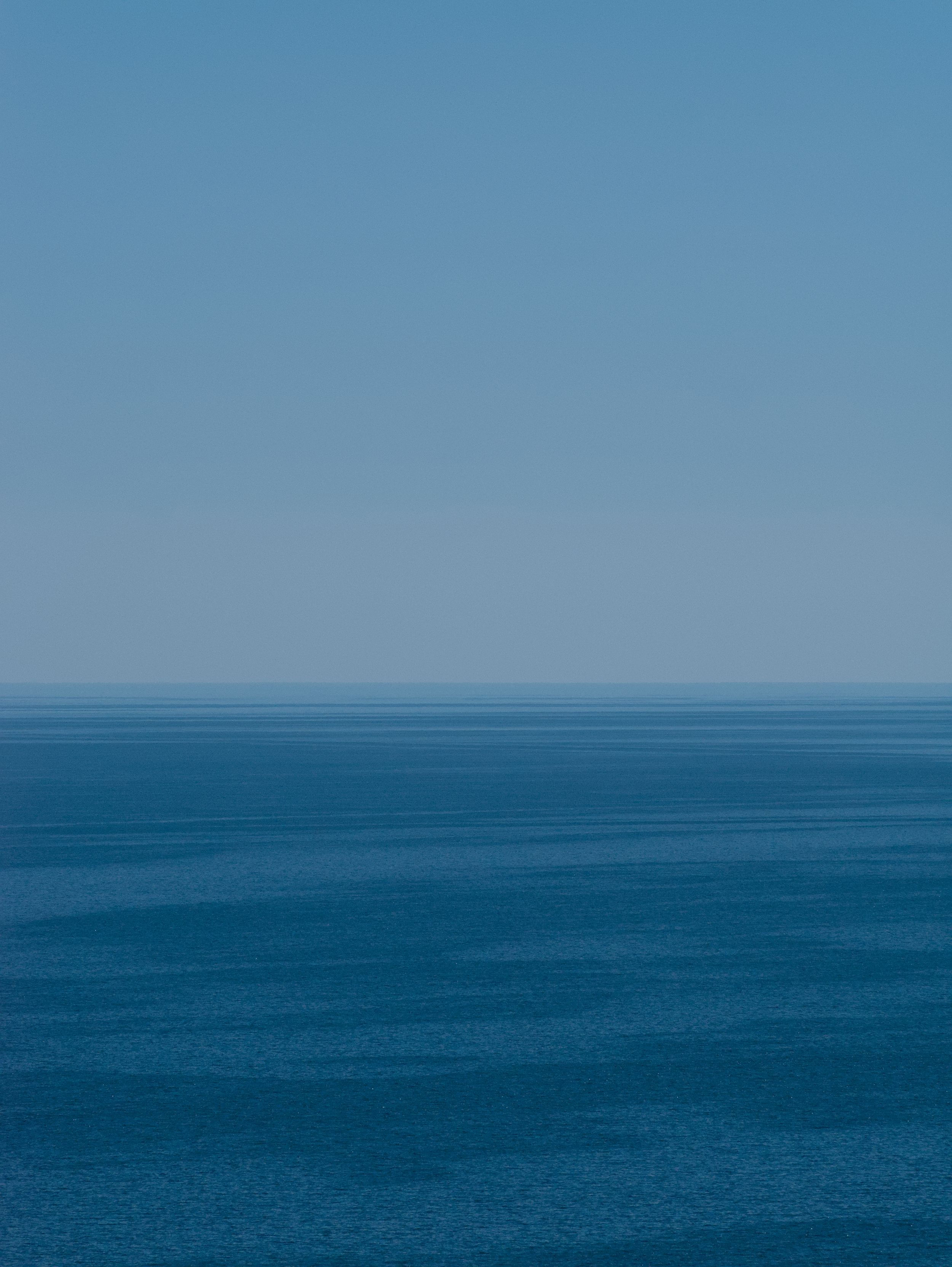 View of a Blue Sea under a Blue Sky · Free Stock Photo