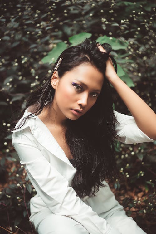 Photo of Woman Holding Her Hair