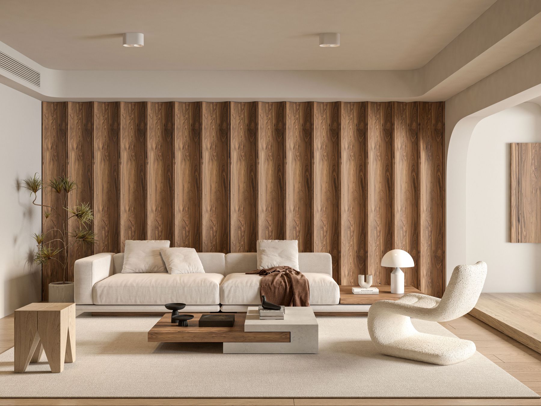 Refined luxury apartment living room with vertical walnut paneling, pale sculptural seating and a layered timber-and-stone coffee table
