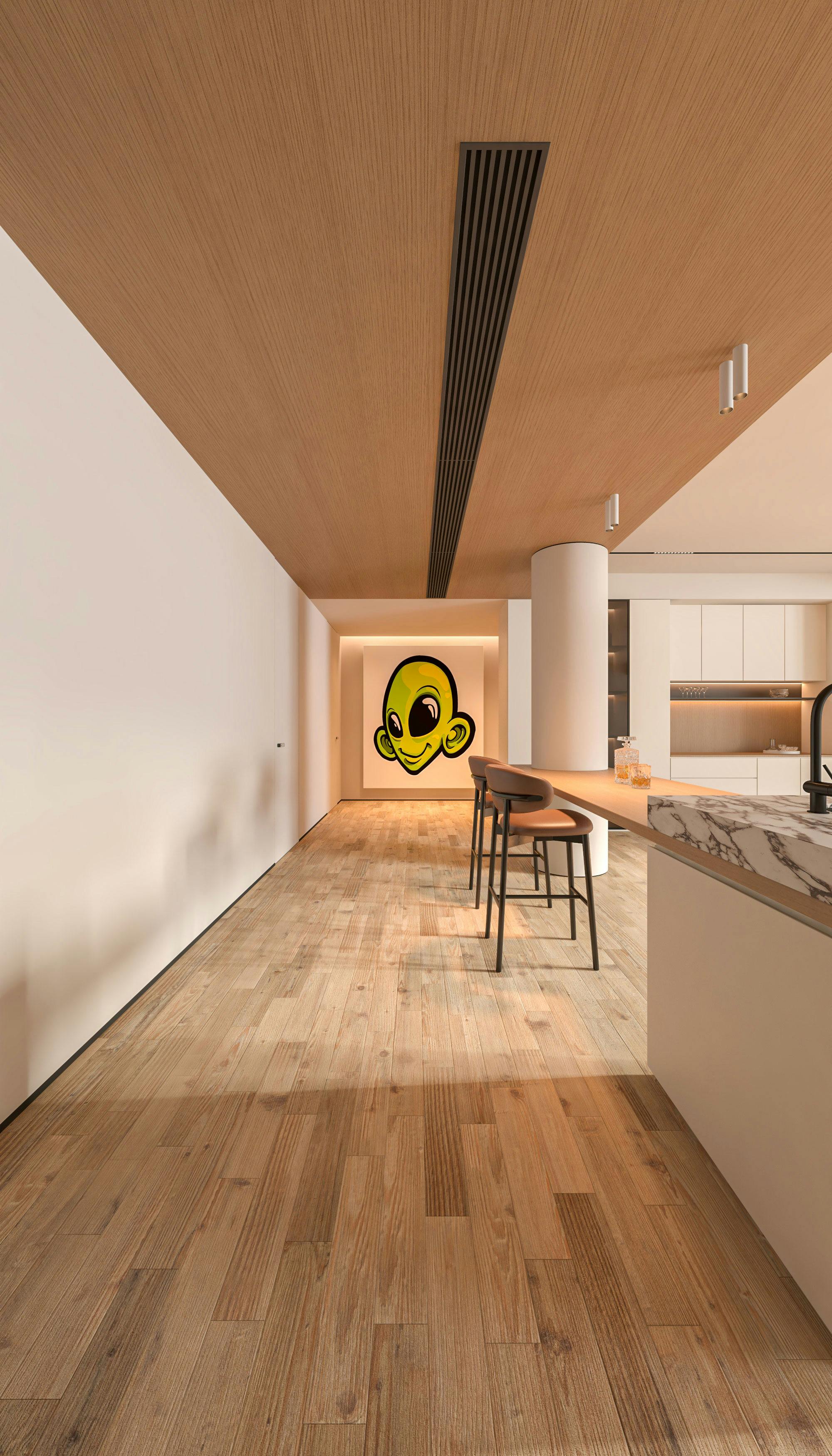 Spacious modern kitchen with unique alien-themed wall art