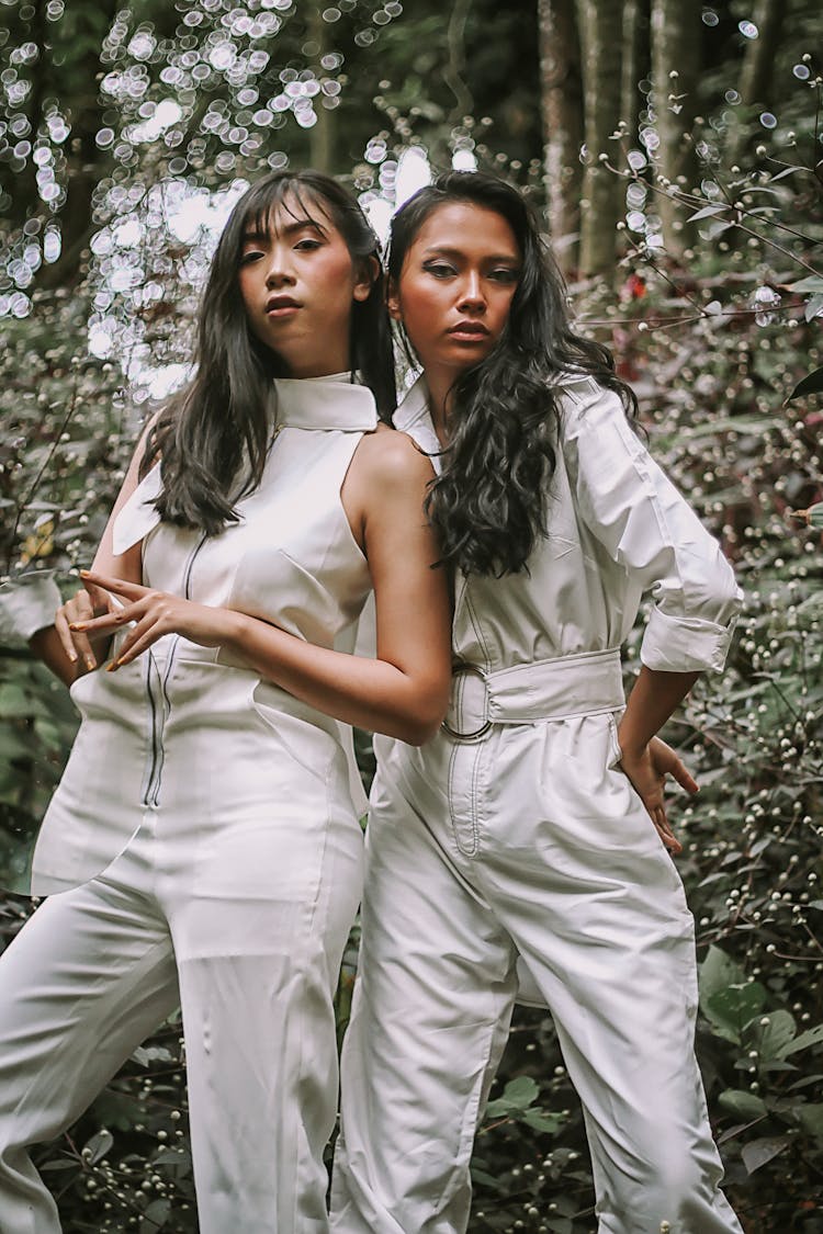 Photo Of Two Women Wearing White Jumpsuit