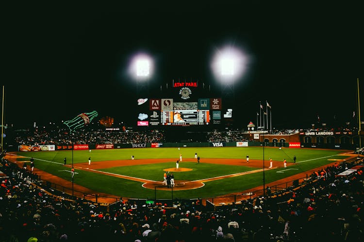 Baseball Player Playing In Baseball Stadium