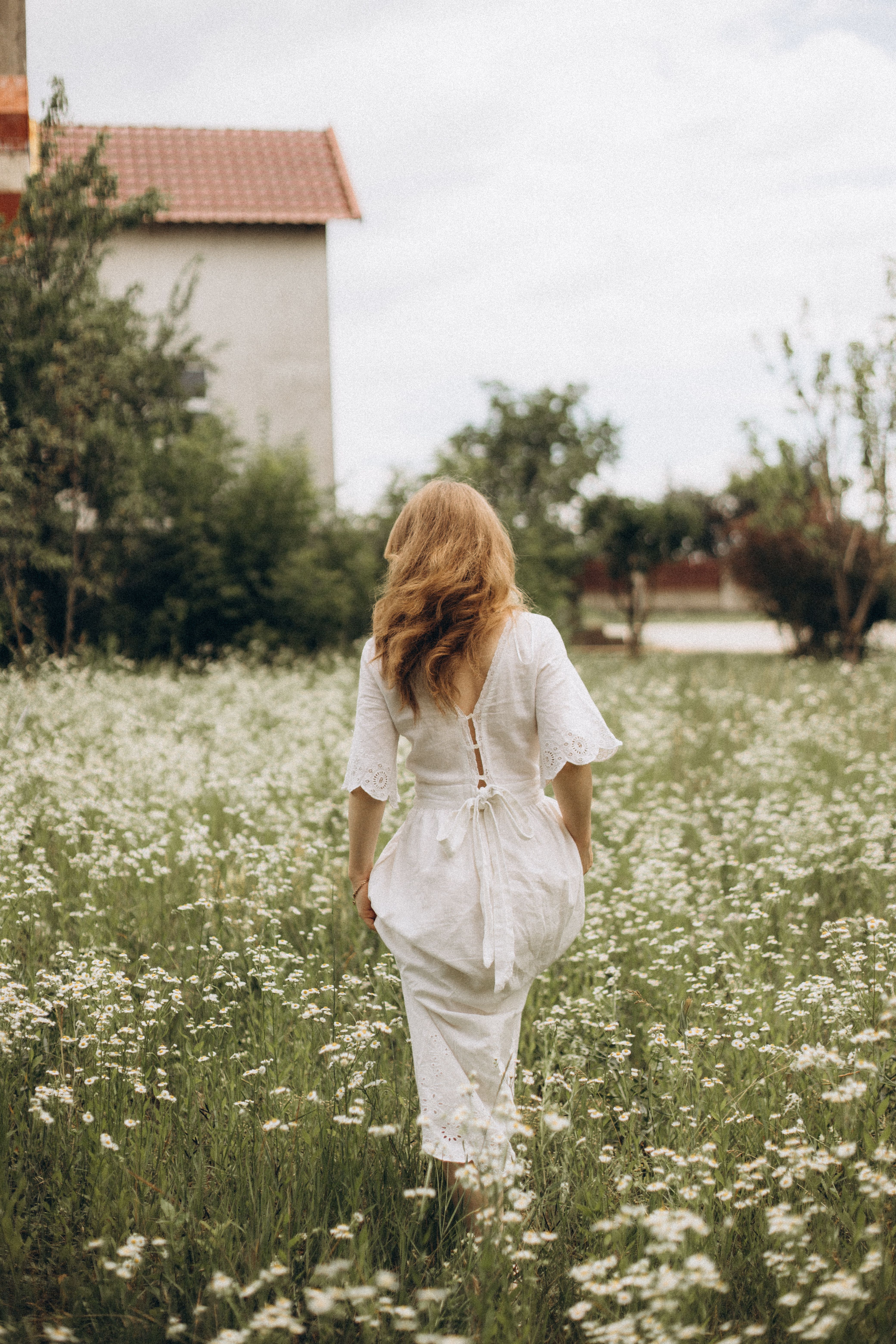 Woman in White Dress Walking on Meadow · Free Stock Photo