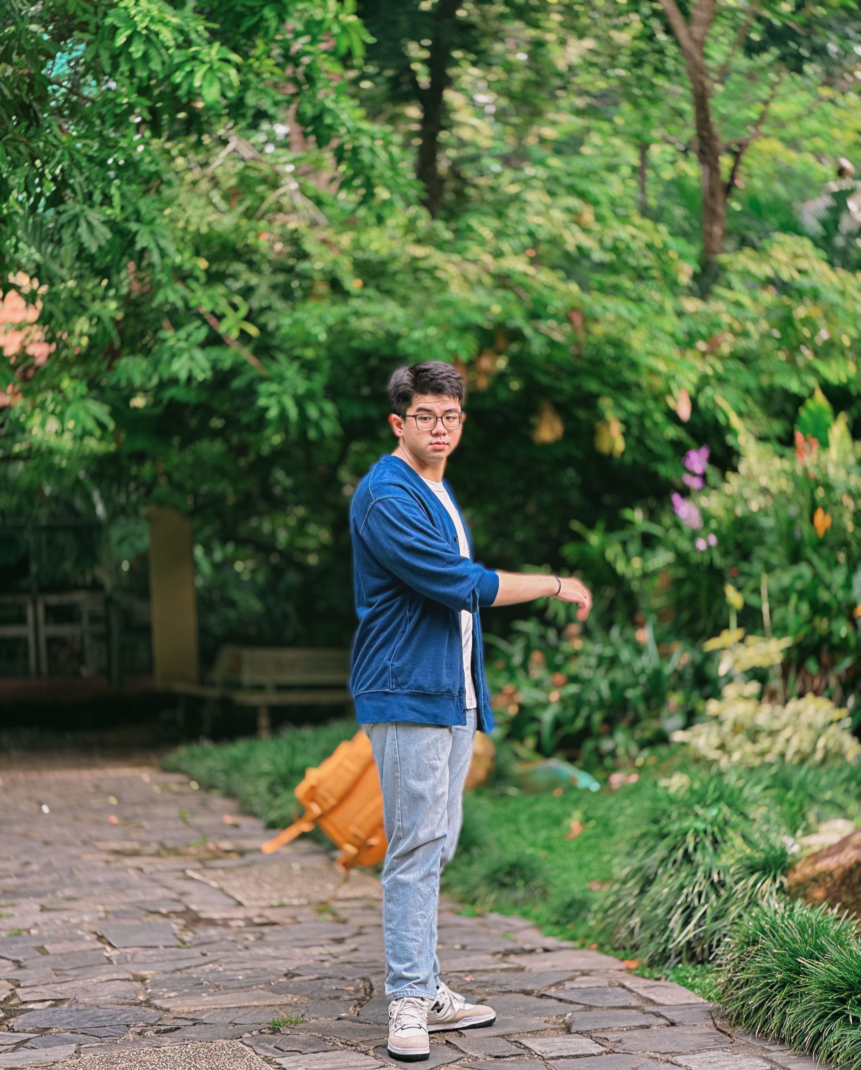 Man with Backpack on a Path Among Trees · Free Stock Photo
