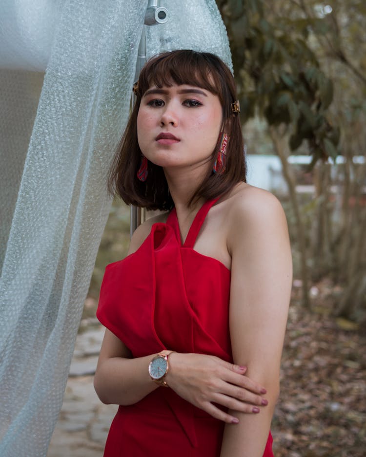 A Beautiful Woman In Red Clothing