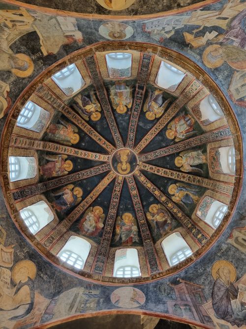 Free Intricate Byzantine dome with ancient religious mosaics and painting inside a historic church. Stock Photo