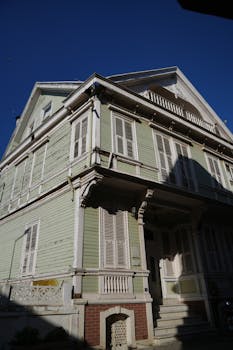 A charming vintage Ottoman-style house in Mudanya, Türkiye, showcasing intricate wooden architecture.