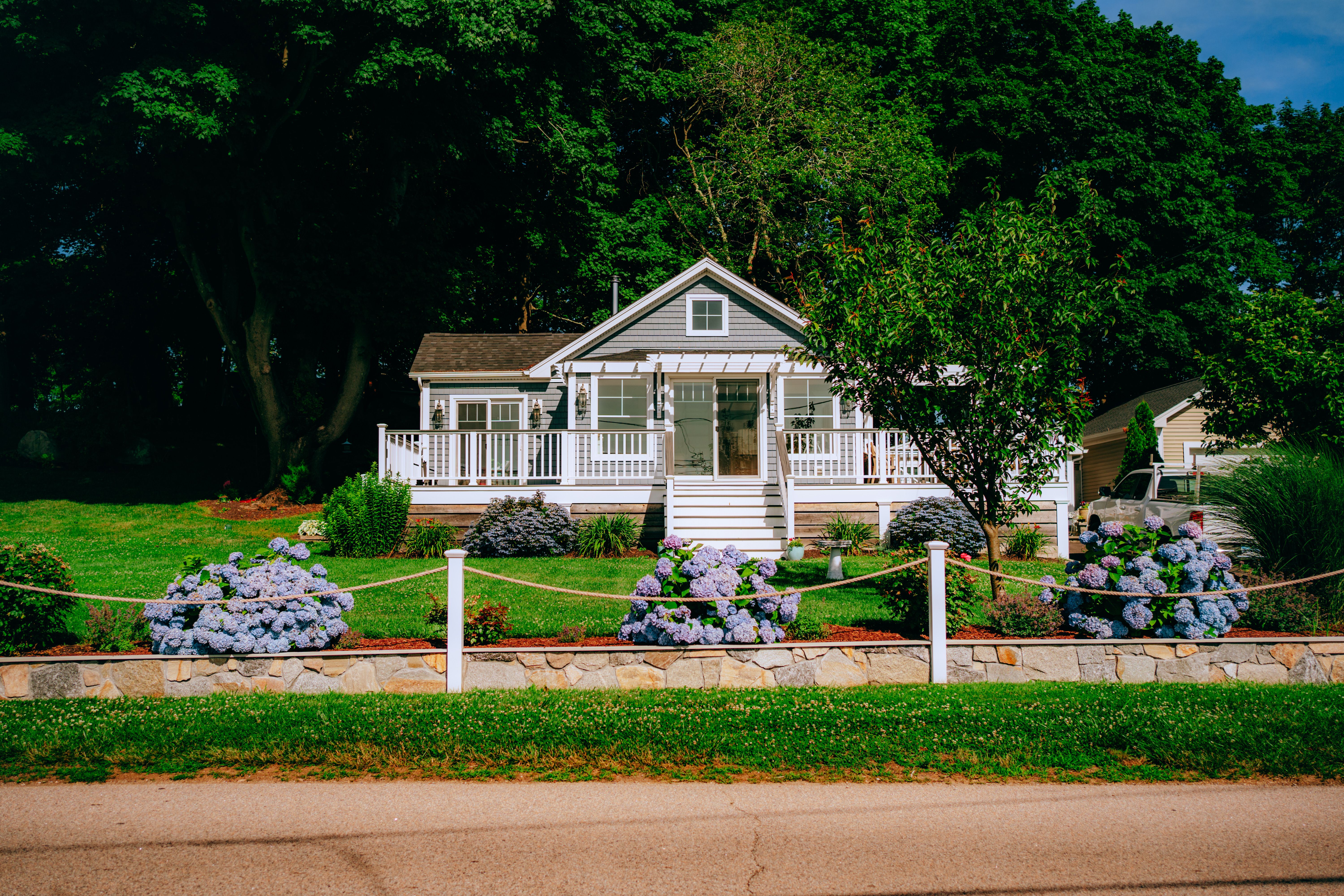 Cottage-style front garden with layered perennial planting