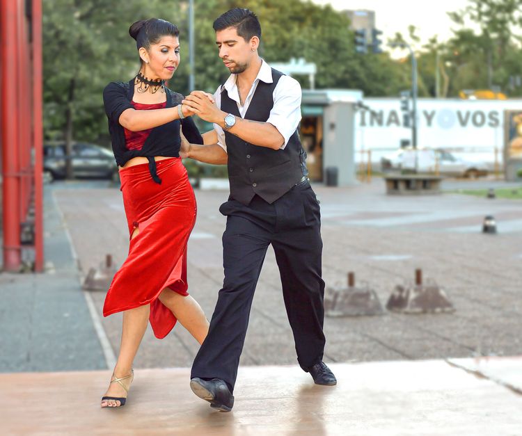 Couple in an abrazo during a milonga