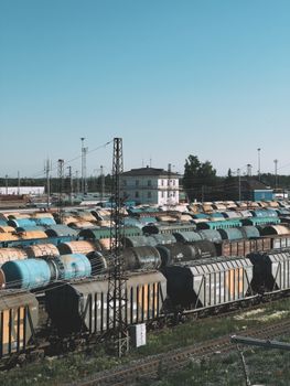 Aerial view of colorful freight trains in an industrial rail yard in Ufa, Russia.