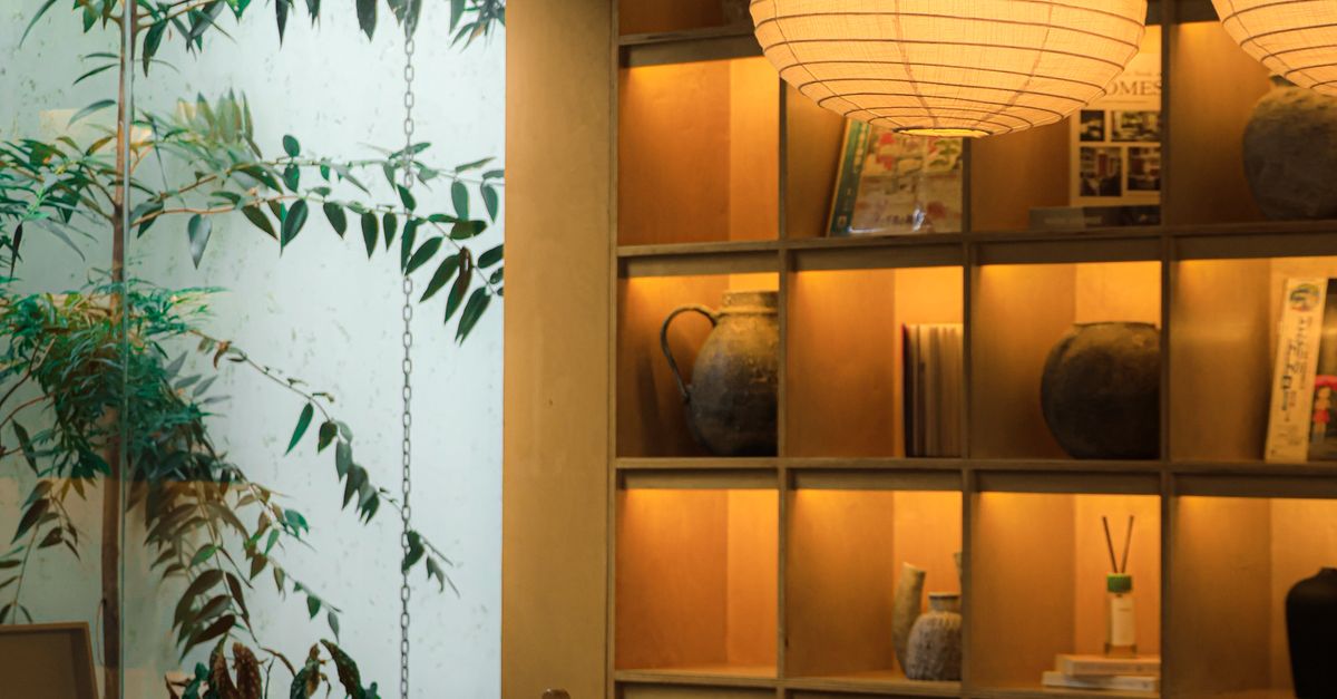 Book Behind Table Shelf with Decoration and Books behind Dining Table · Free Stock Photo