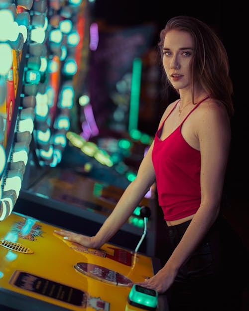Woman Near Arcade Machine