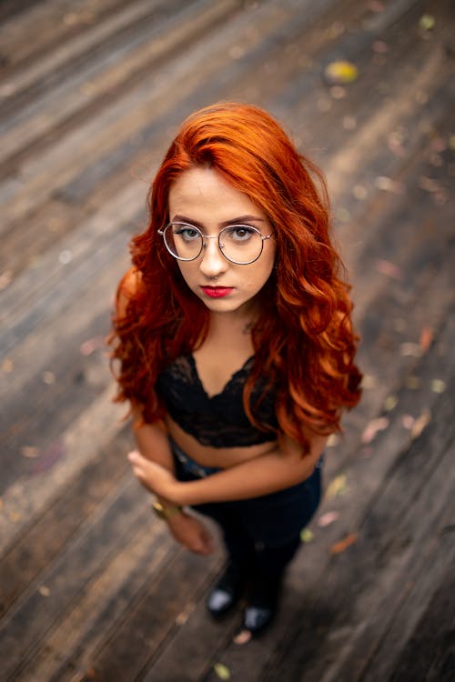 Free High-Angle Photo of Woman Wearing Eyeglasses Stock Photo