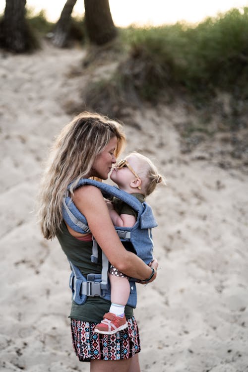 Free Mother Kissing Her Daughter Stock Photo