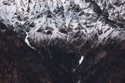 Stunning view of snowy, rugged mountain peaks showcasing natural beauty and extreme terrain.