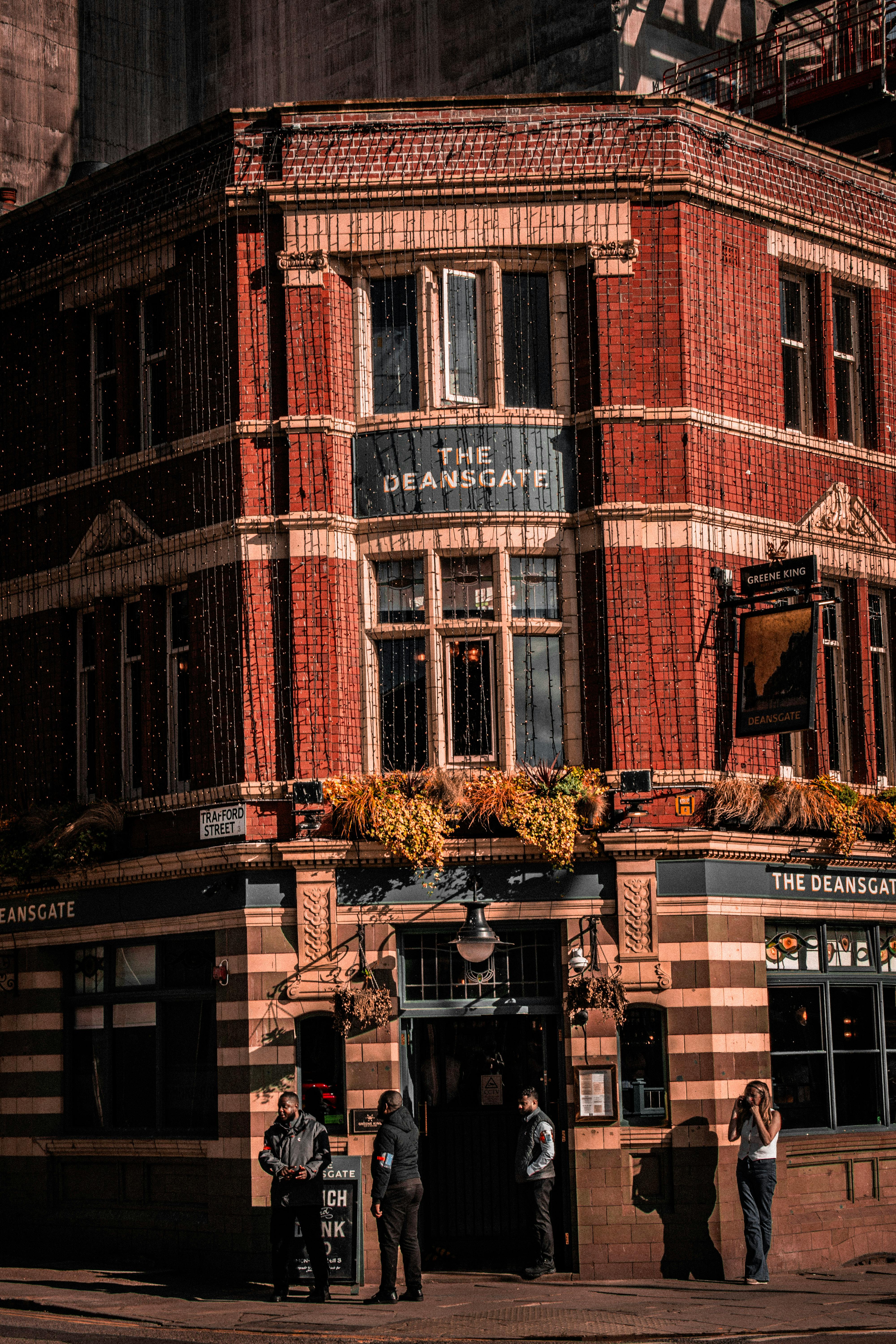 Free A vibrant street view of the historic Deansgate building in Manchester, featuring urban architecture. Stock Photo