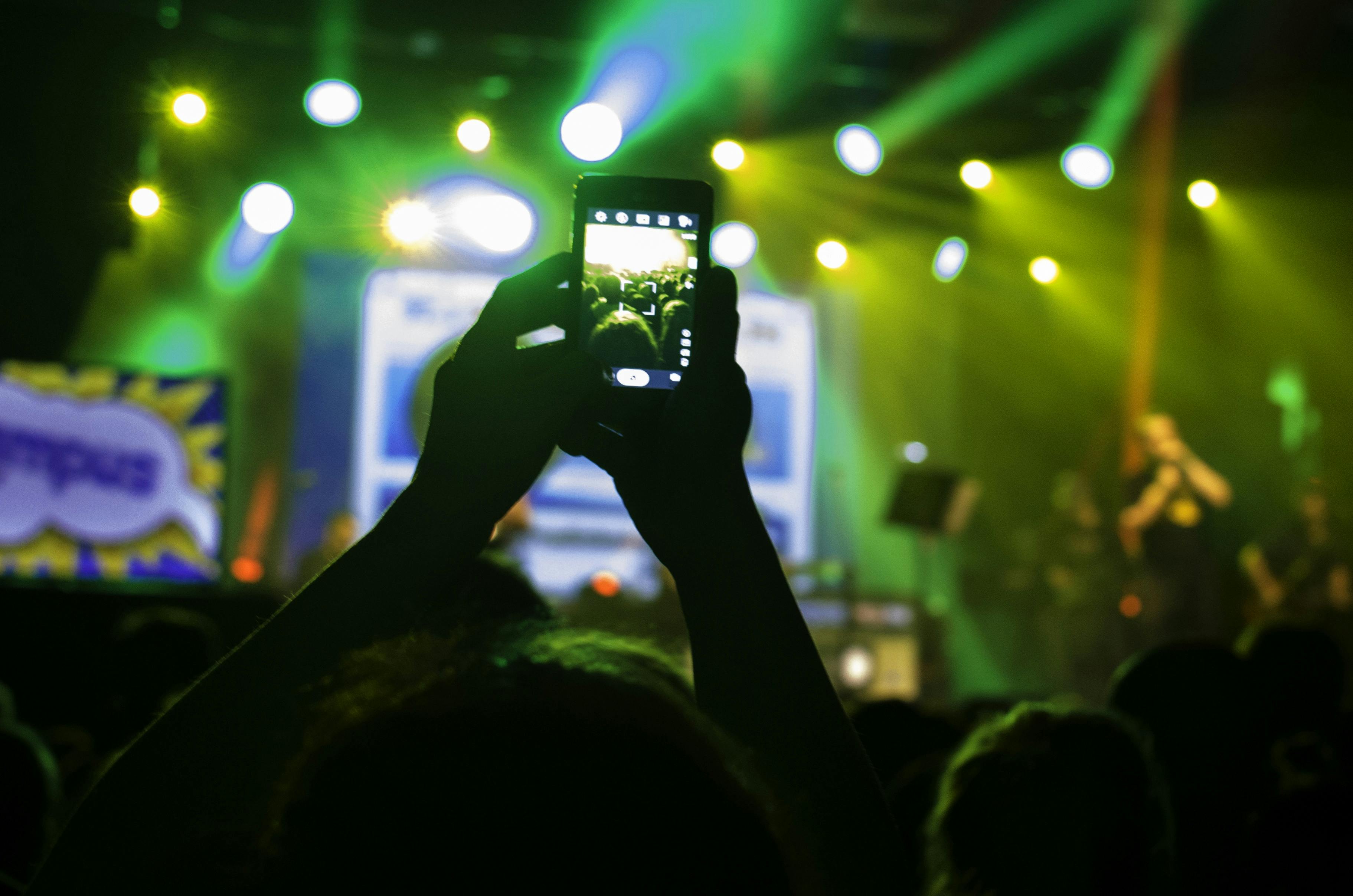 Image result for phone at concert