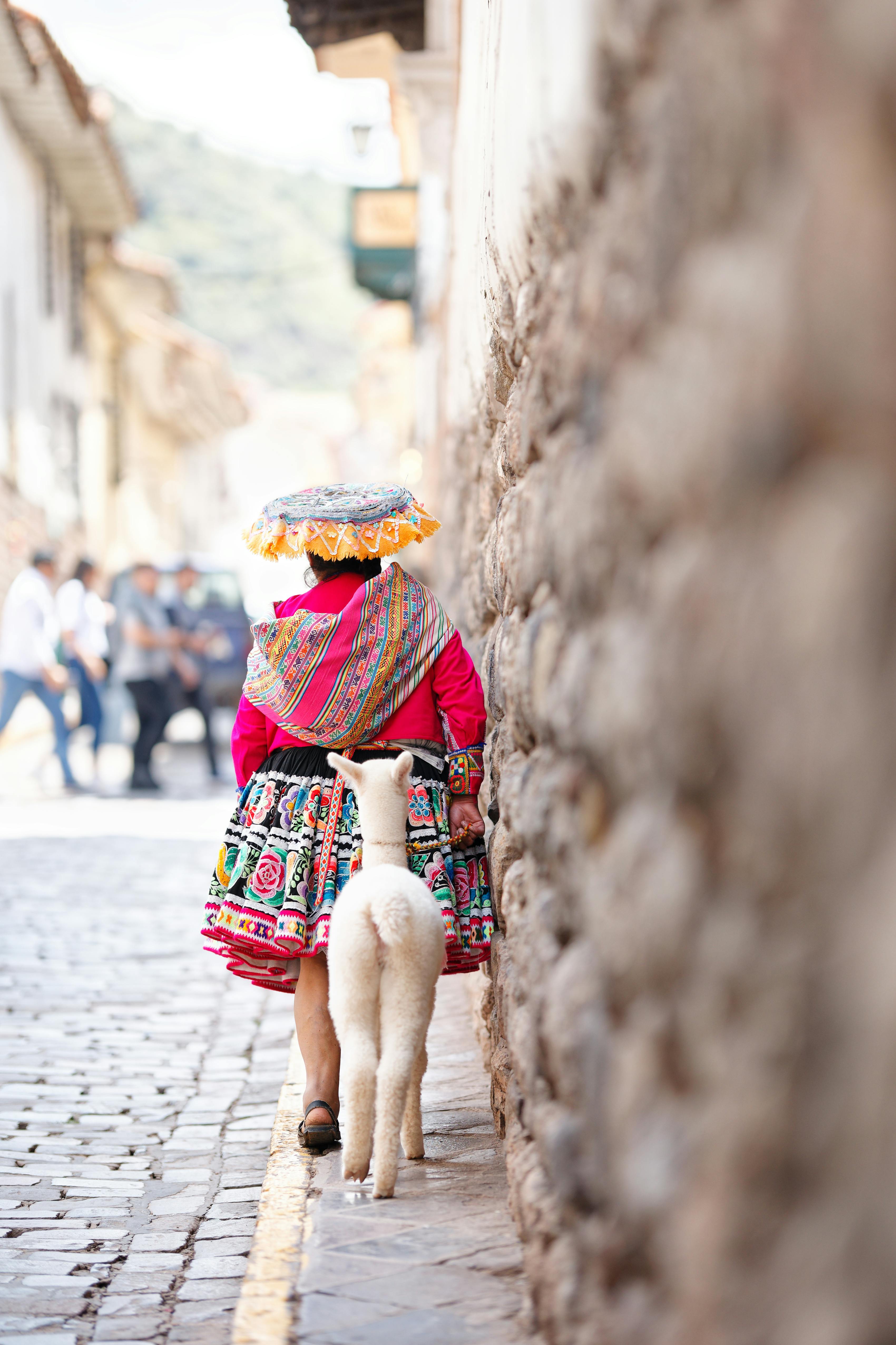 peruvian women with traditional dress in cusco