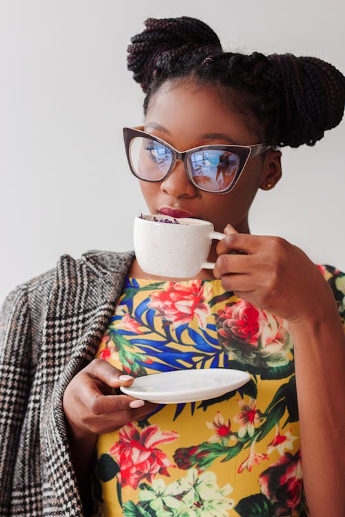 woman drinking tea with sugar substitute
