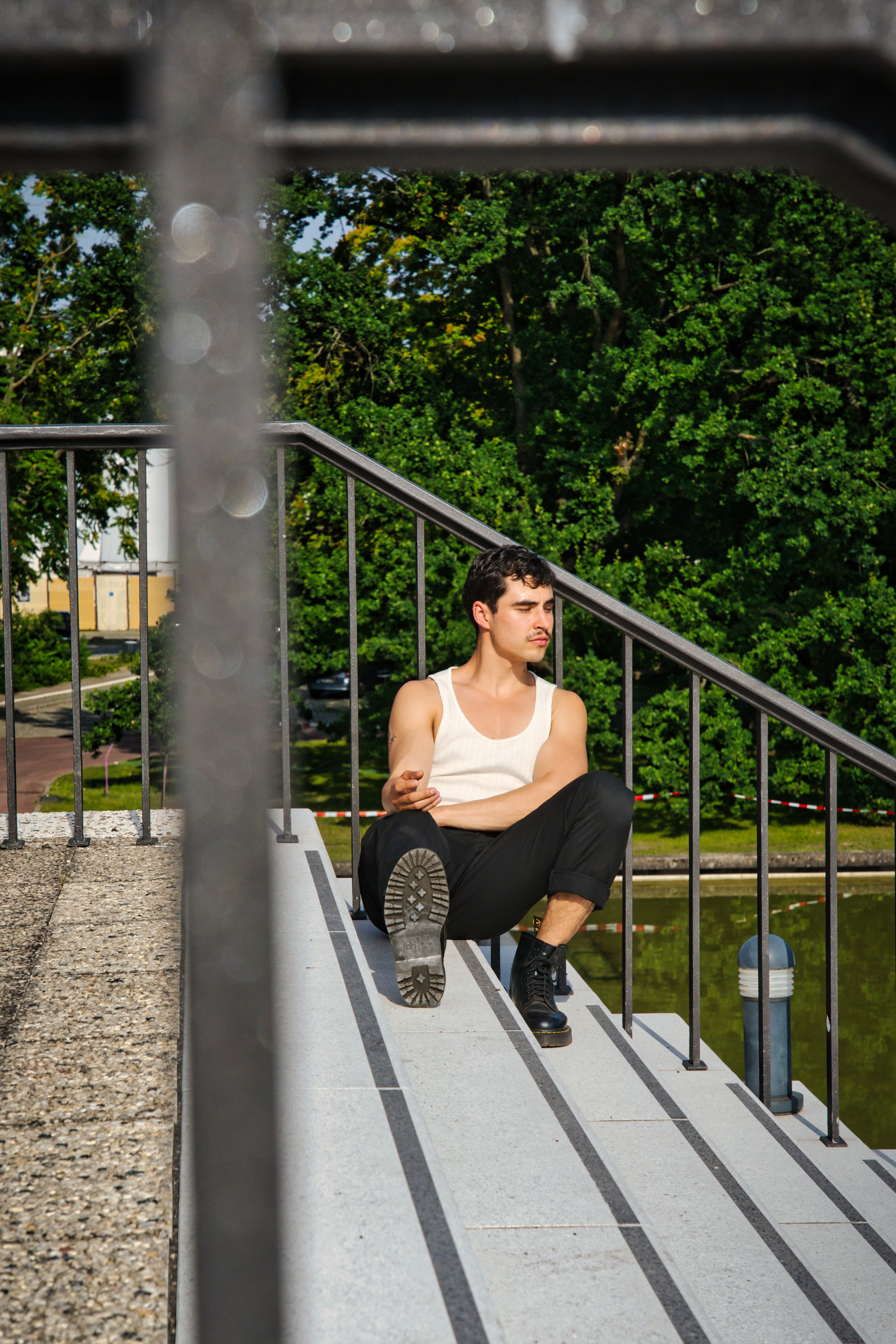 A Man Sitting on a Step · Free Stock Photo