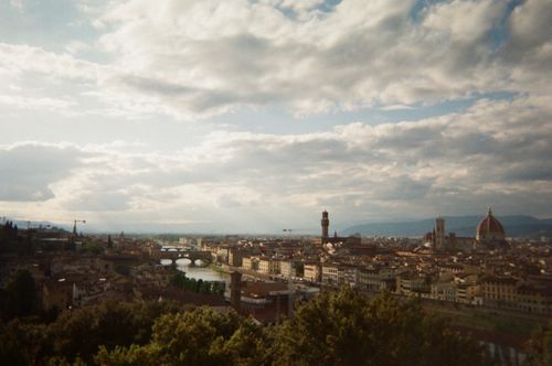 Free A breathtaking panoramic view of Florence with iconic landmarks and the Arno River. Stock Photo