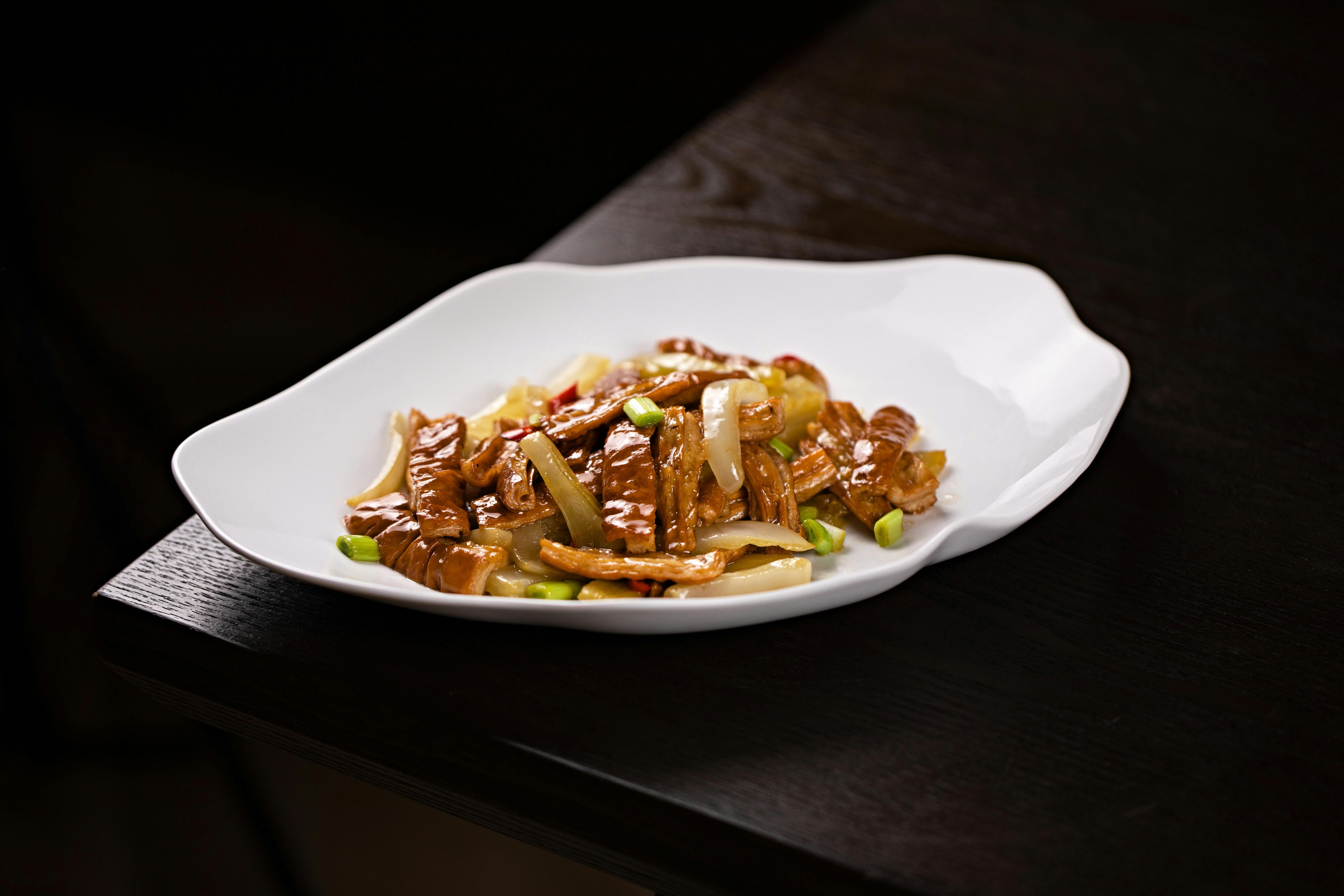 Stir Fry With Dark Sauces On A Plate