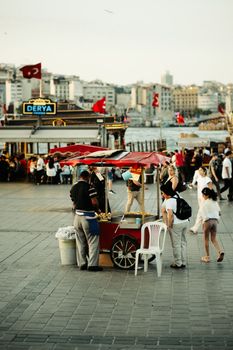 Vibrant street market scene with people and vendors in Istanbul, Turkey.