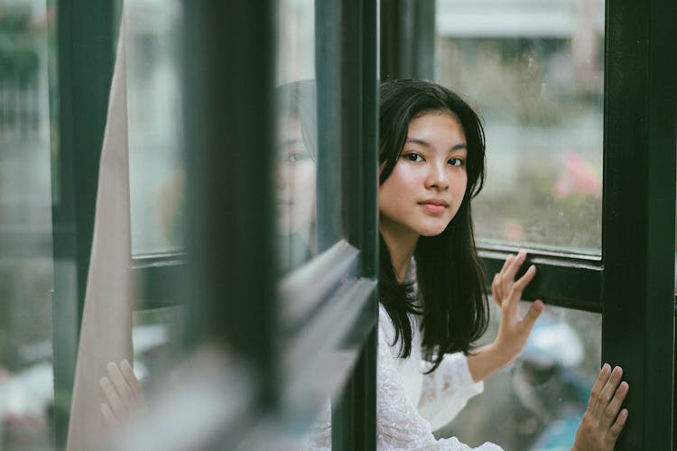 Photo Of Woman Opening Door