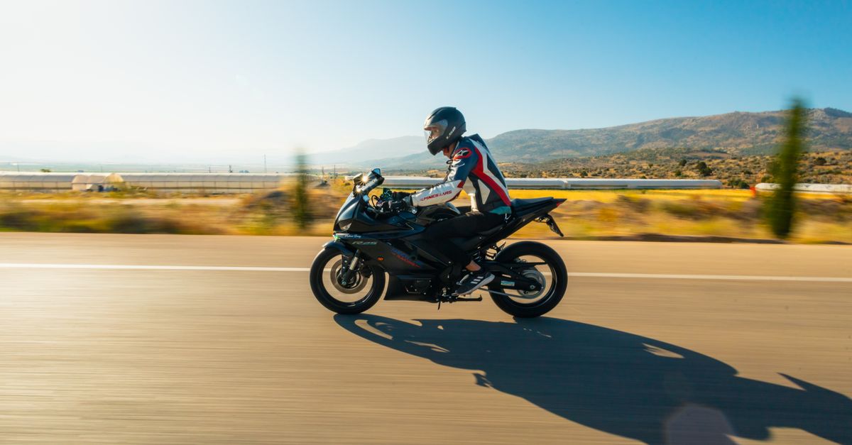 Person Rider Person Riding a Motorbike · Free Stock Photo