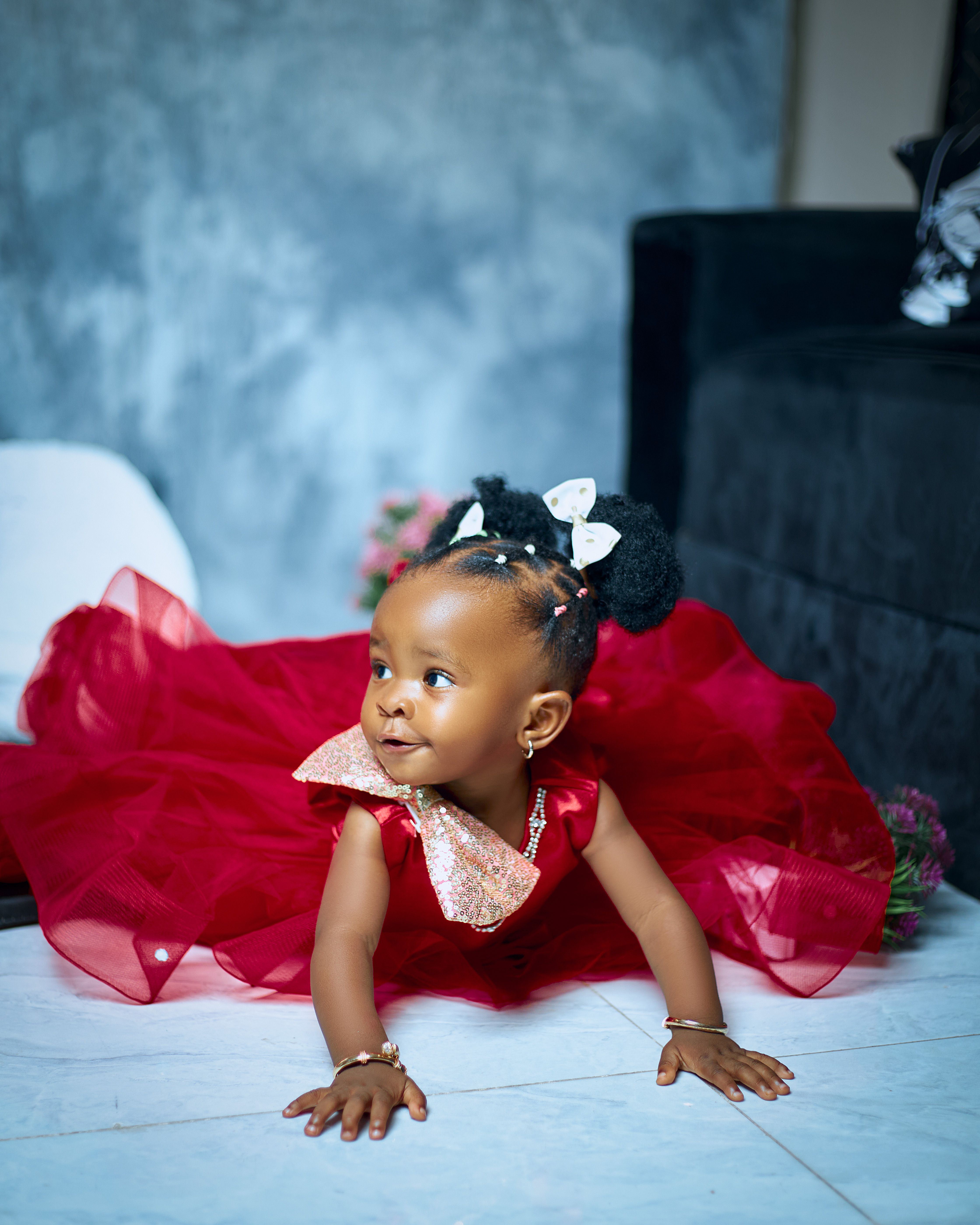 Girl Lying Down in Red Dress  Free Stock Photo