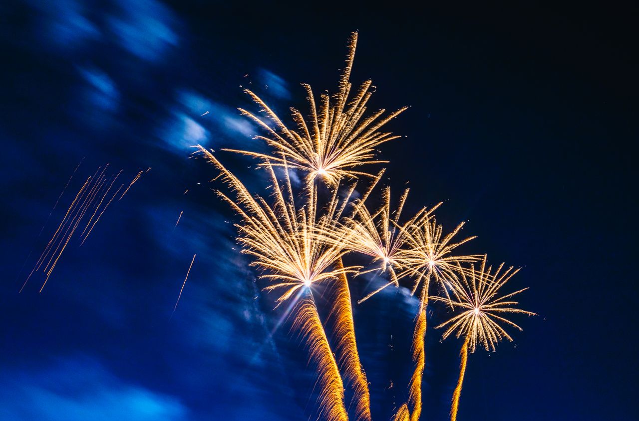 bright fireworks lighting up the night sky with vibrant colors and pat