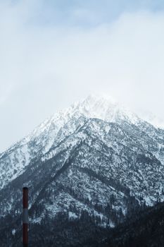 Majestic snow-covered mountain peak in Andorra La Vella, perfect for travel or nature themes.