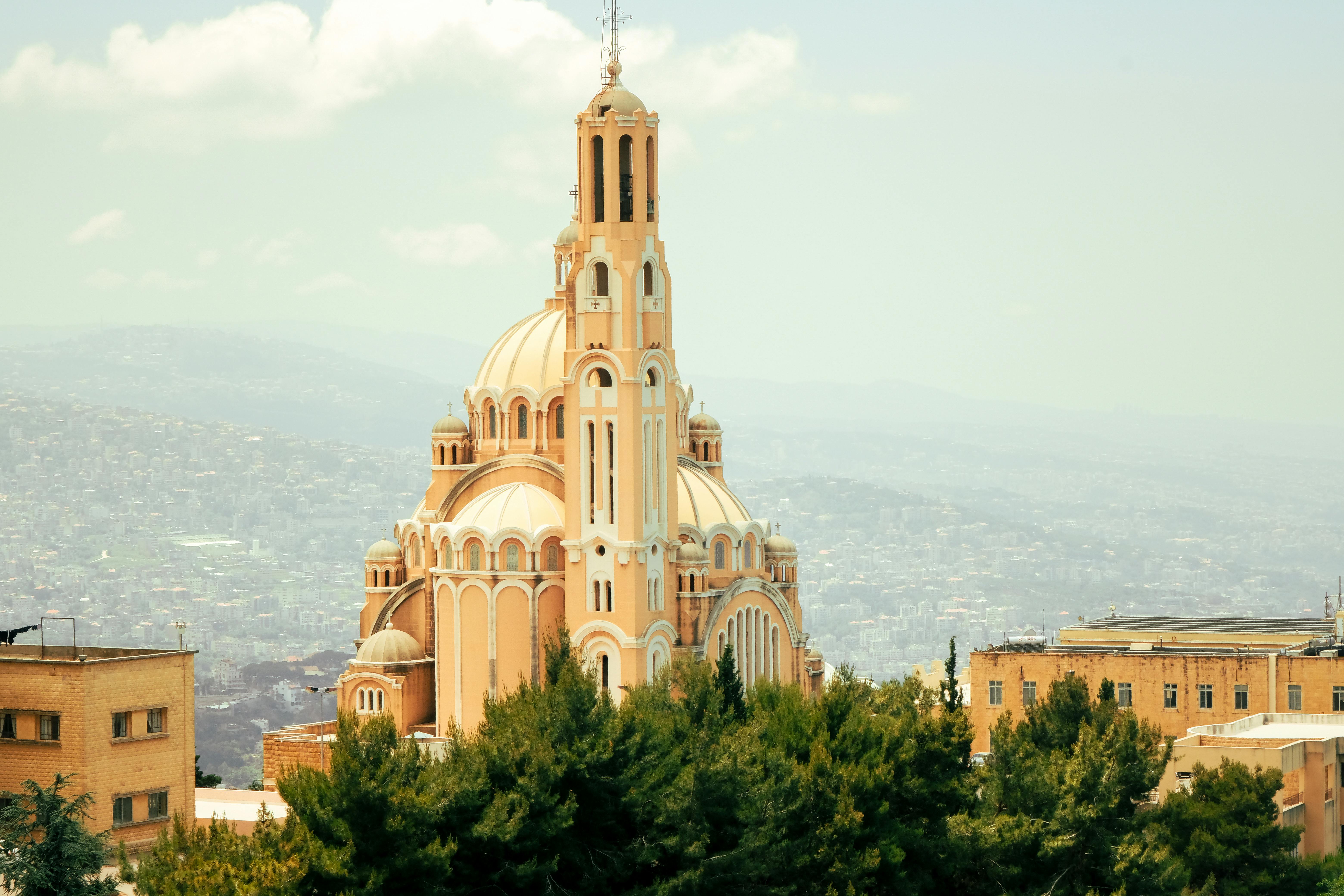 Captivating view of St. Paul Basilica, a landmark in Harissa, with cityscape of Lebanon.