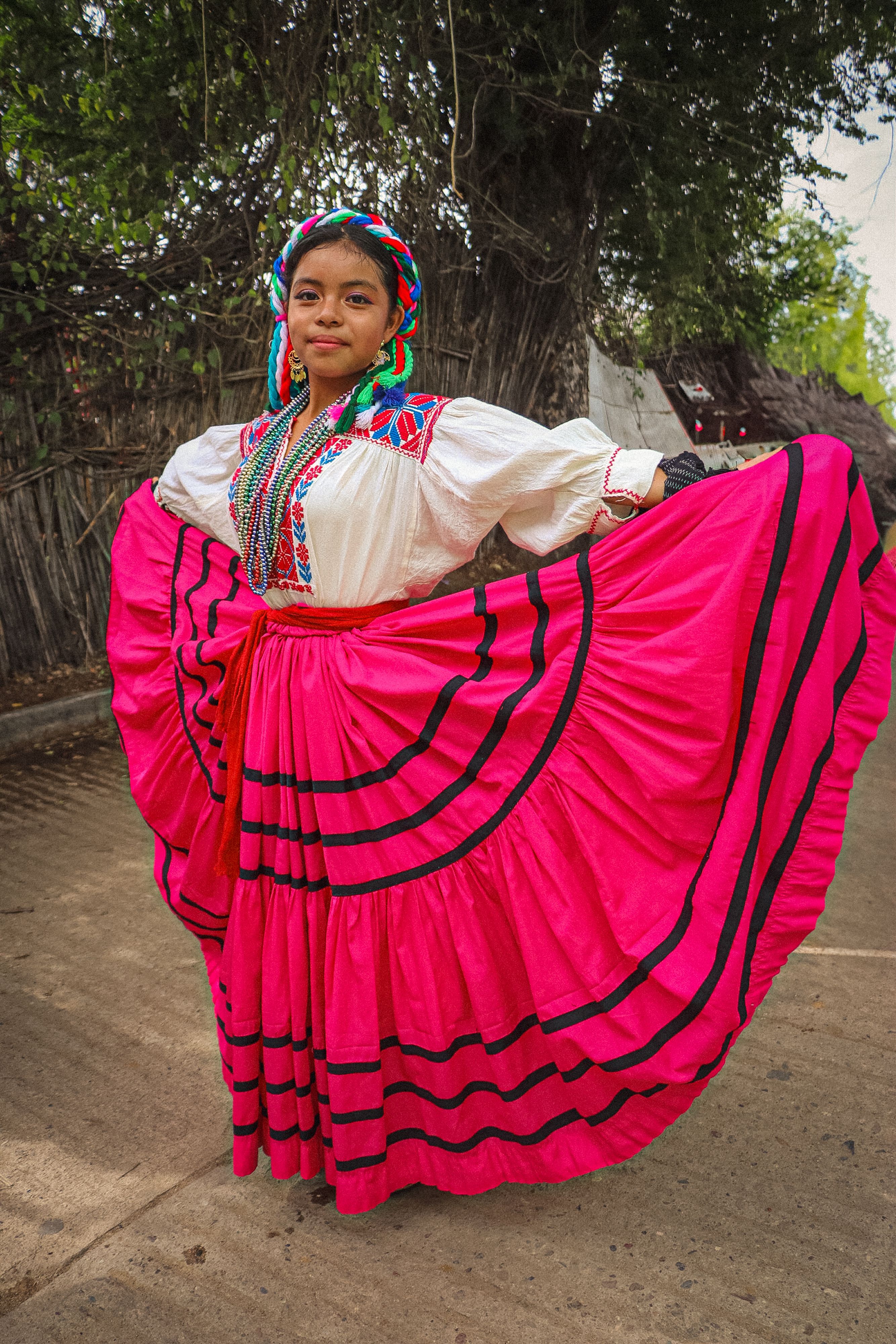 Girl Standing in Traditional Clothing · Free Stock Photo