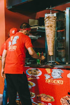 Street food vendor preparing doner kebab in Kuala Lumpur.