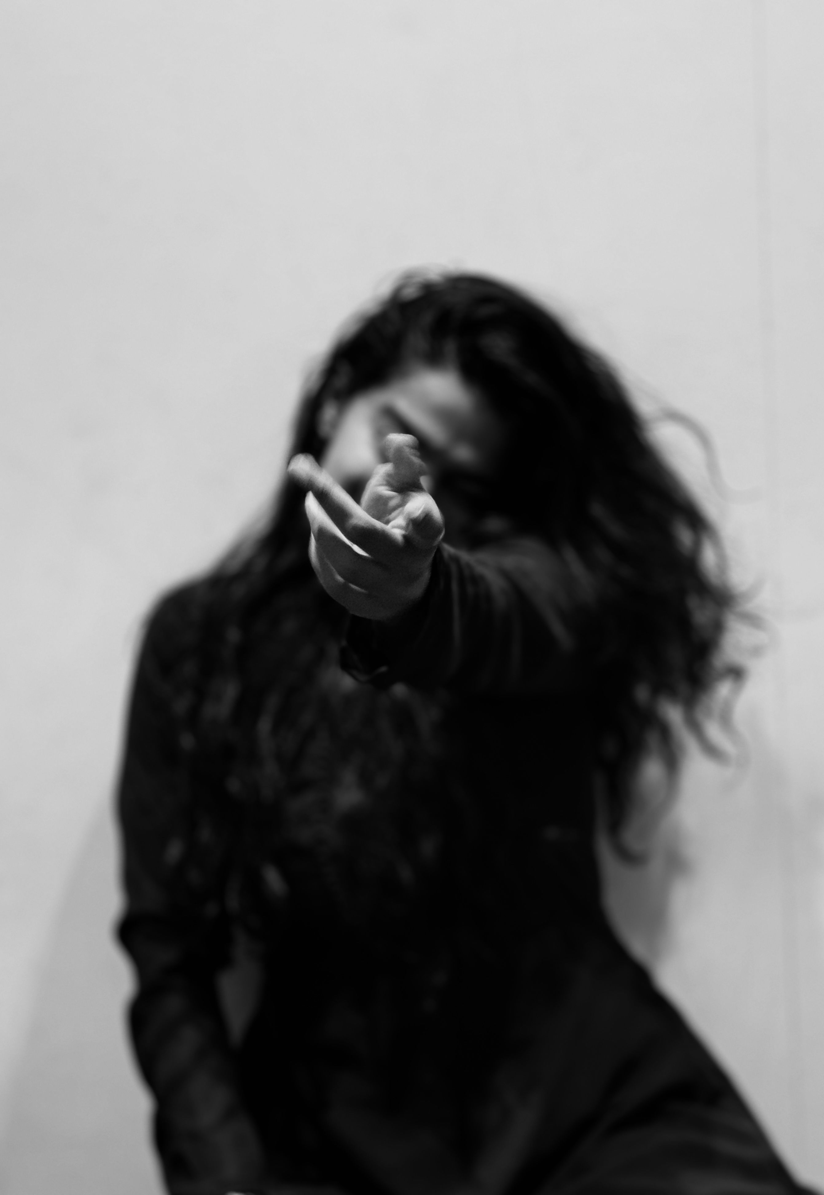 Black and White Photo of a Woman Reaching out her Hand · Free Stock Photo