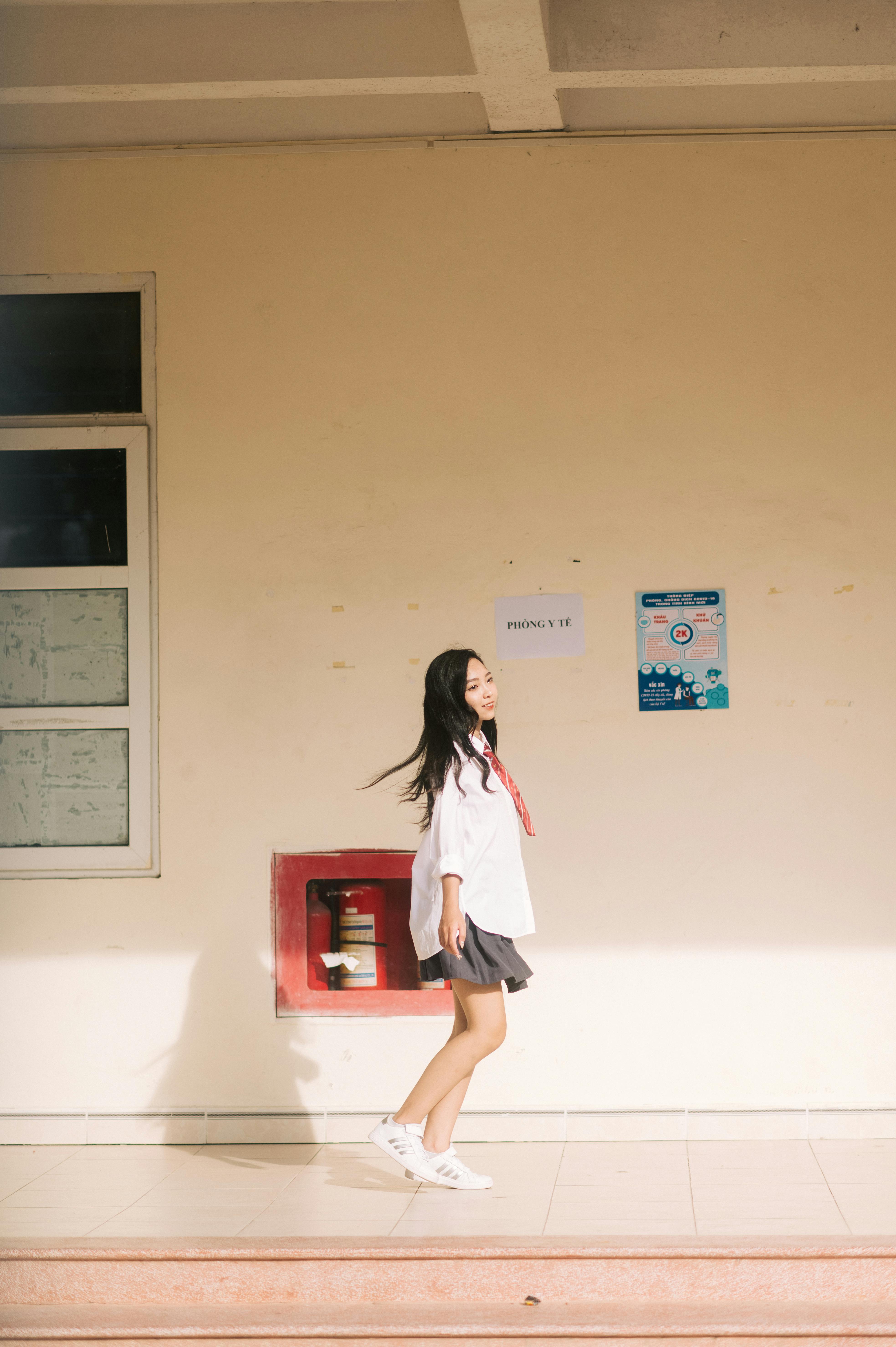 a girl wearing a skirt