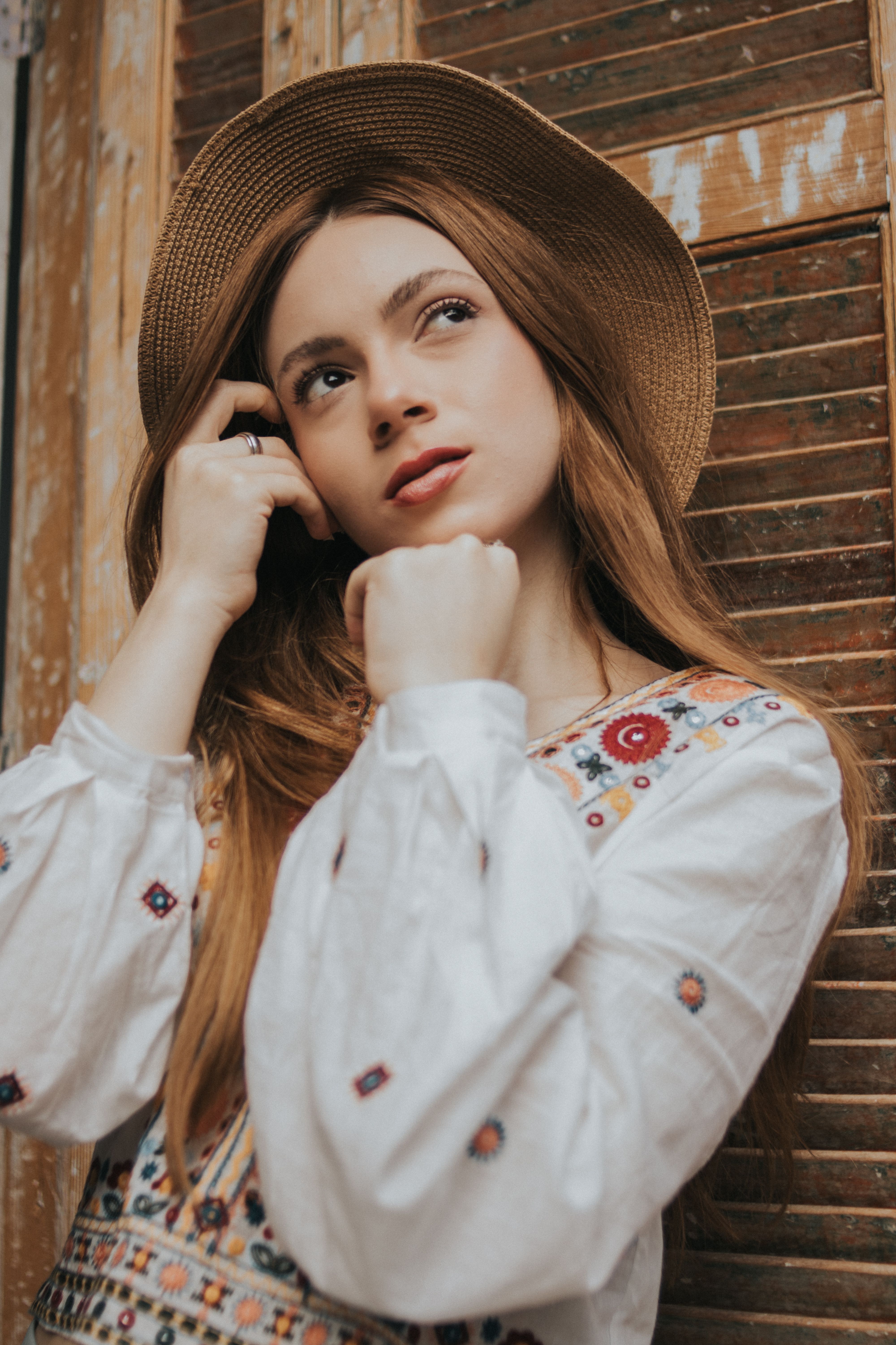 Portrait of a Woman Wearing a Hat · Free Stock Photo
