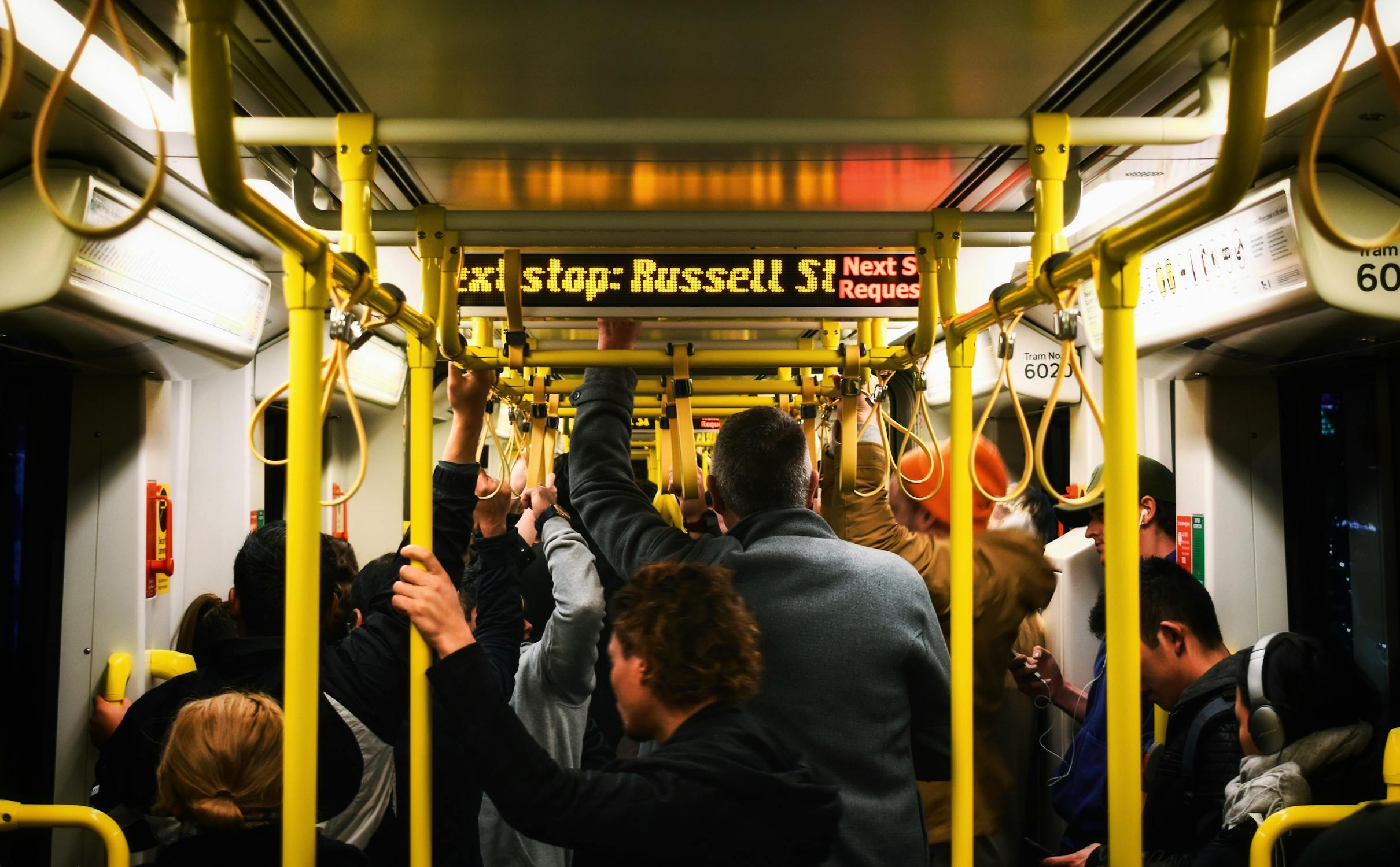Crowded commute Photo by Rishiraj  Parmar from Pexels: https://www.pexels.com/photo/people-in-train-2706436/