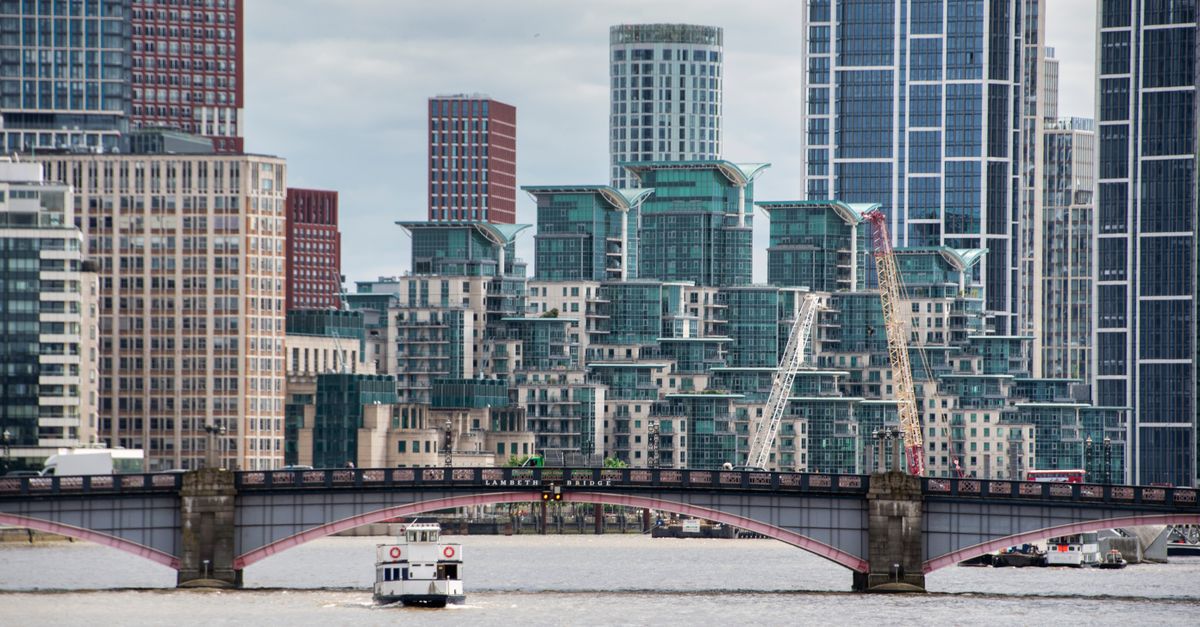 Stunning view of Vauxhall Bridge over the Thames with the modern London skyline.