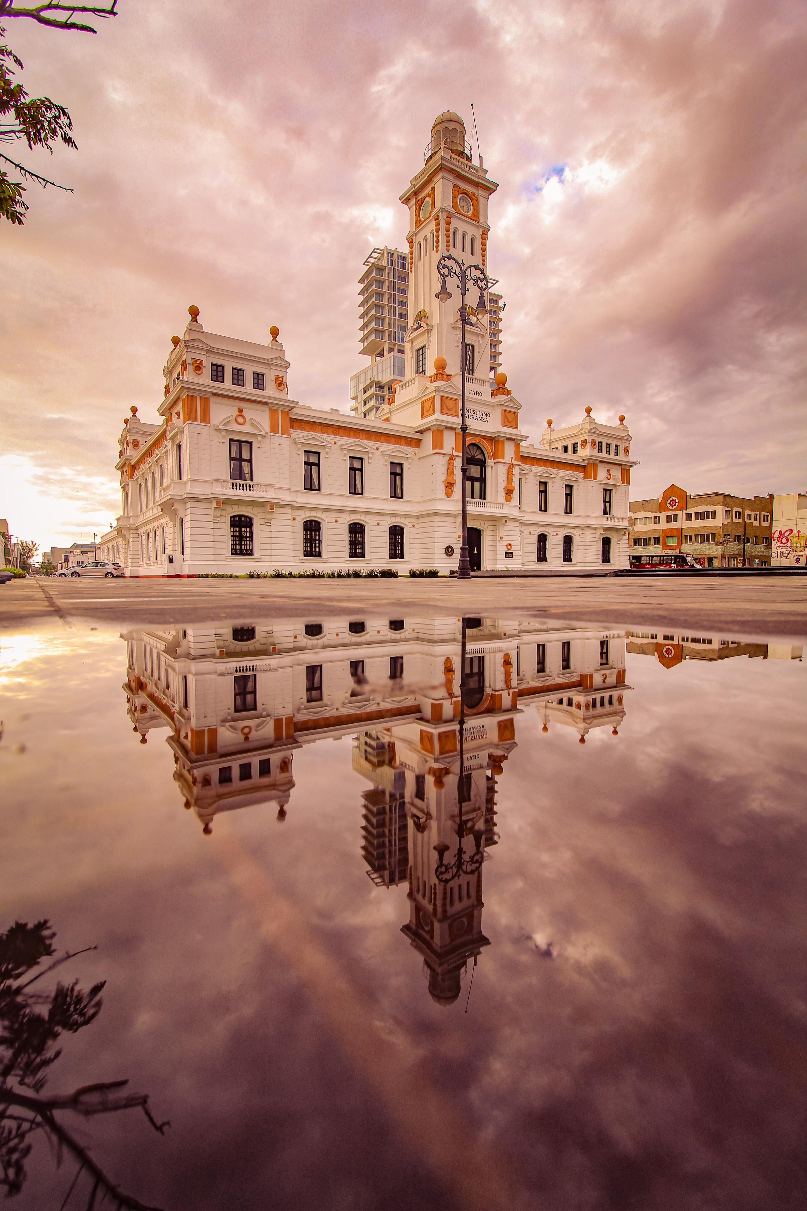 Stunning reflection of Faro Venustiano Carranza in Veracruz, Mexico during sunset.