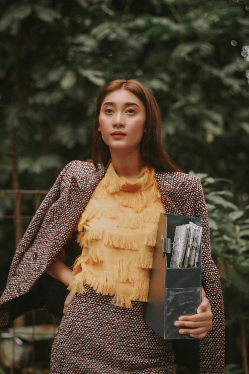 Woman In Brown Skirt And Blazer