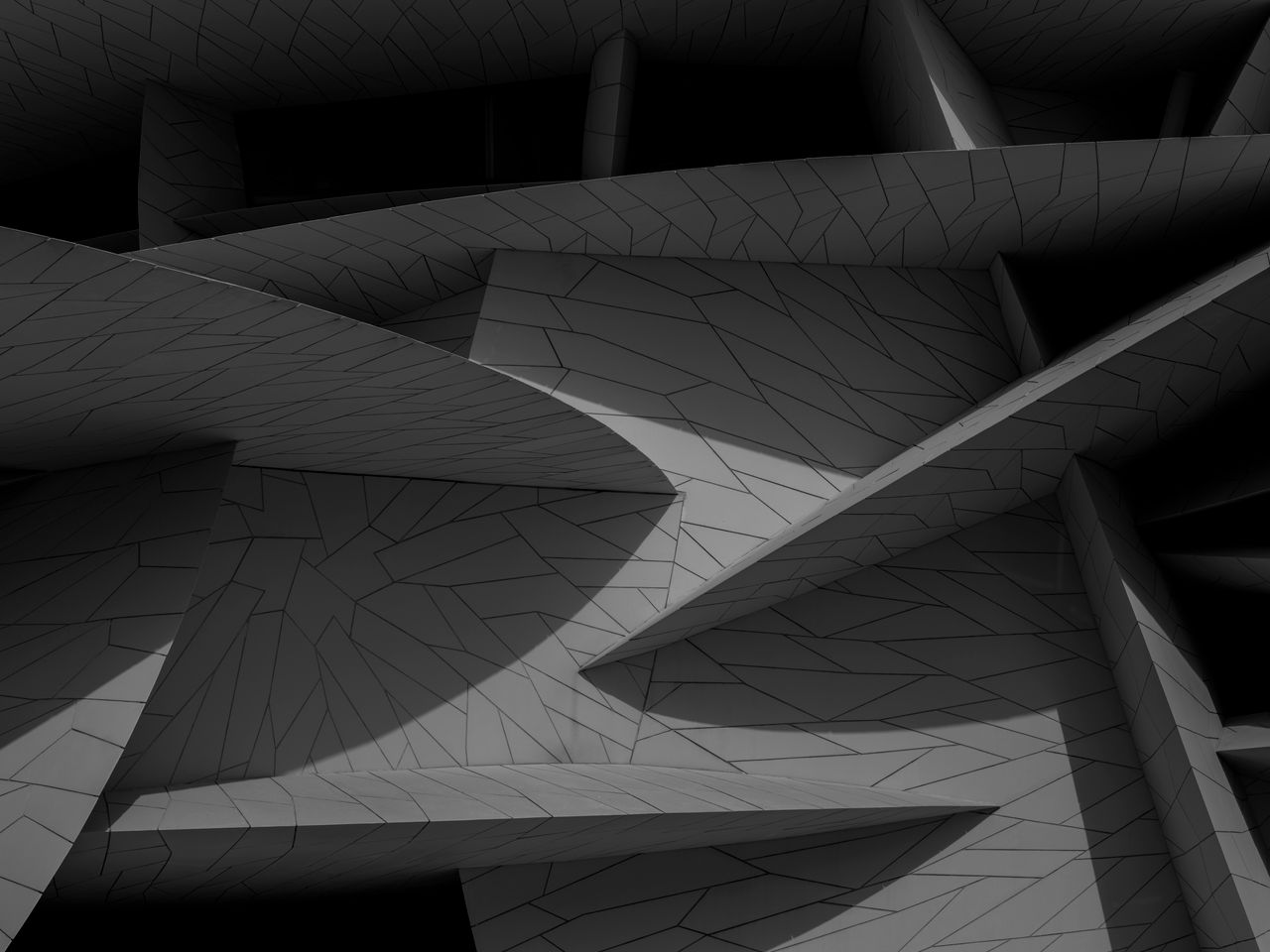 dramatic black and white architectural facade with geometric patterns