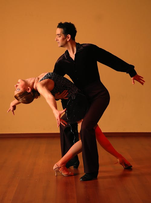 Free Man and Woman Dancing Stock Photo