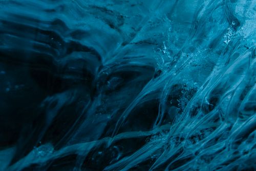 Free Explore the mesmerizing texture of ice formations in a stunning Icelandic ice cave. Stock Photo