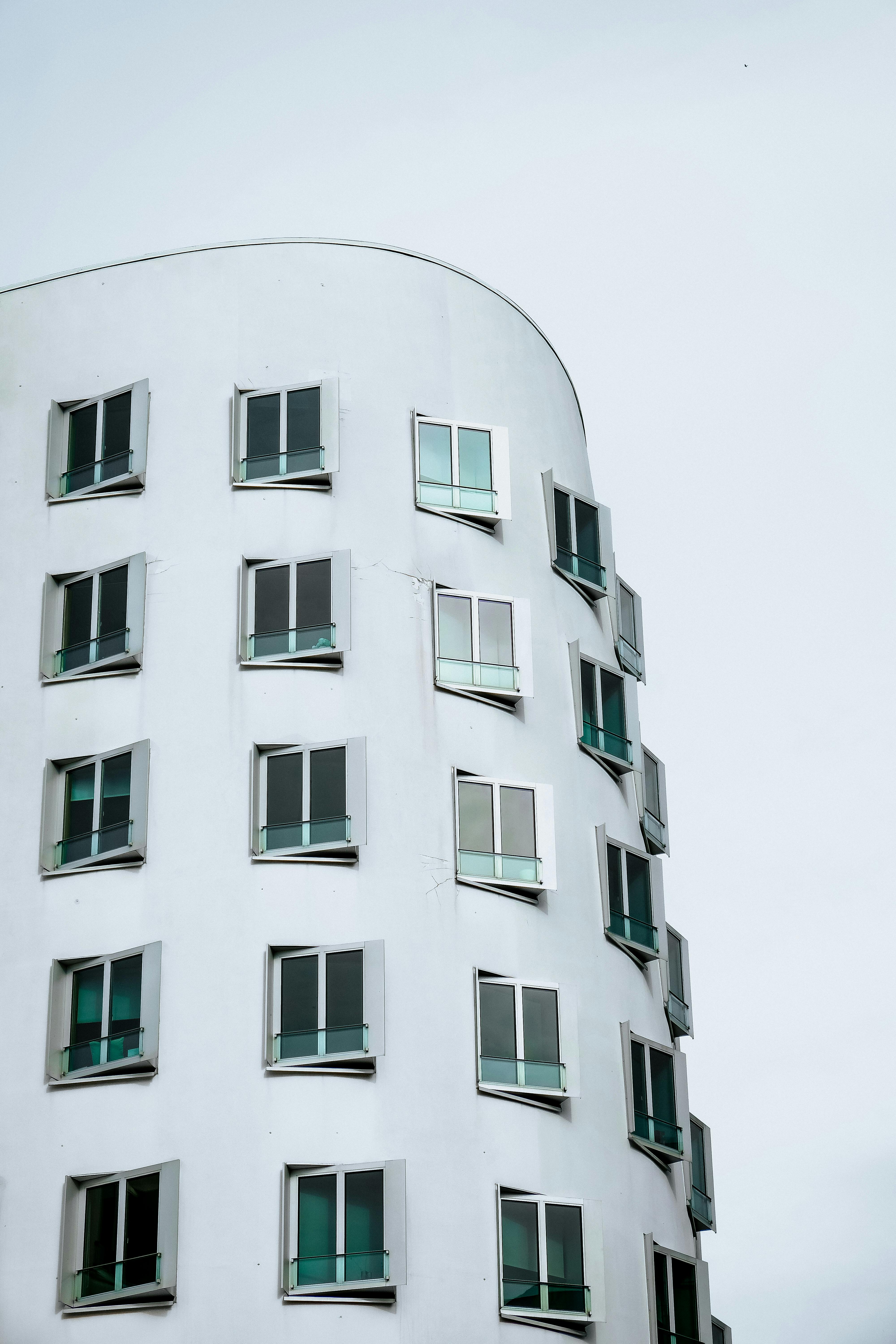 Contemporary building facade with unique window design in Düsseldorf.