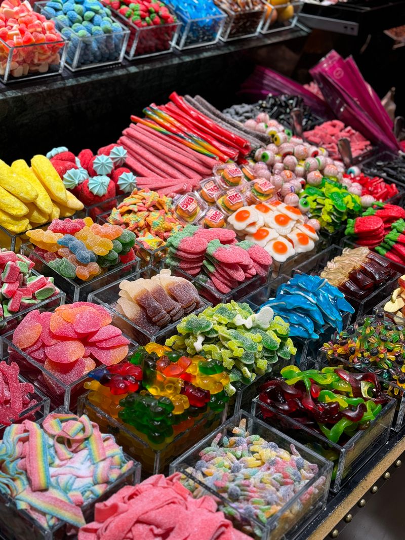 Containers of sweets on a candy shop display at Zingx Home