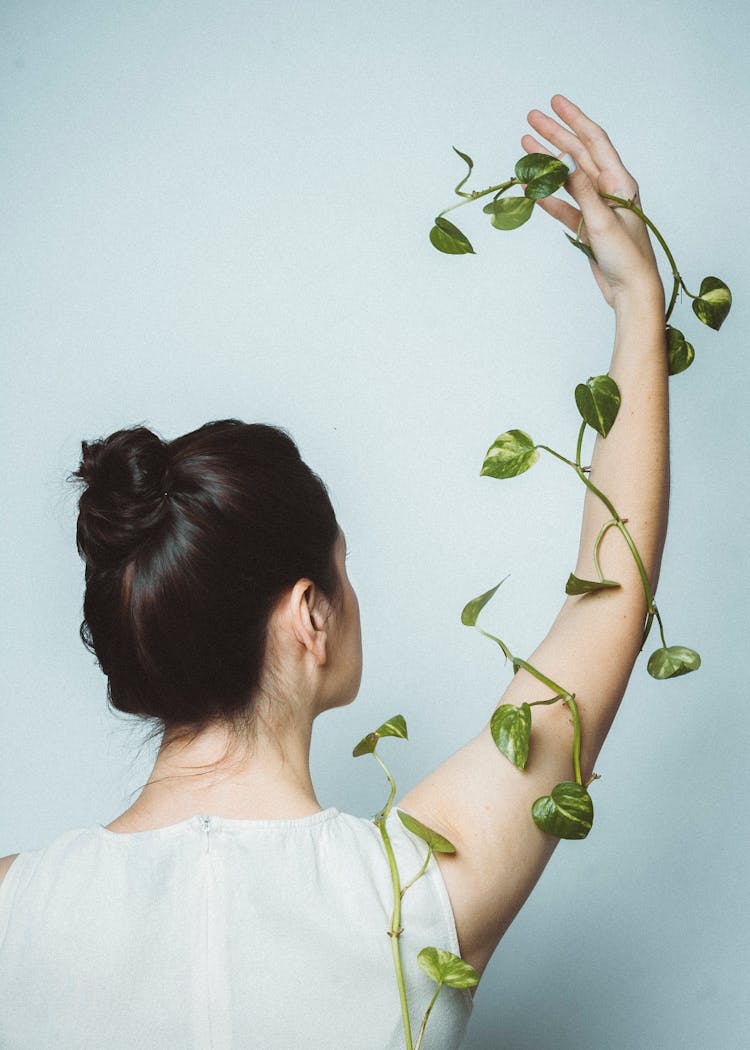 Woman With Plant Leaves 