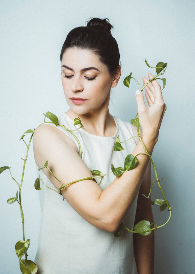 Woman With Plant Leaves 