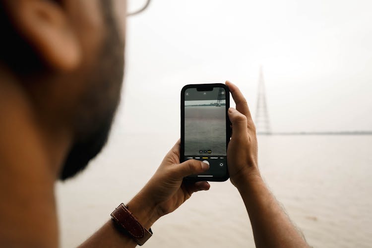 Tourist Filming With A Smartphone